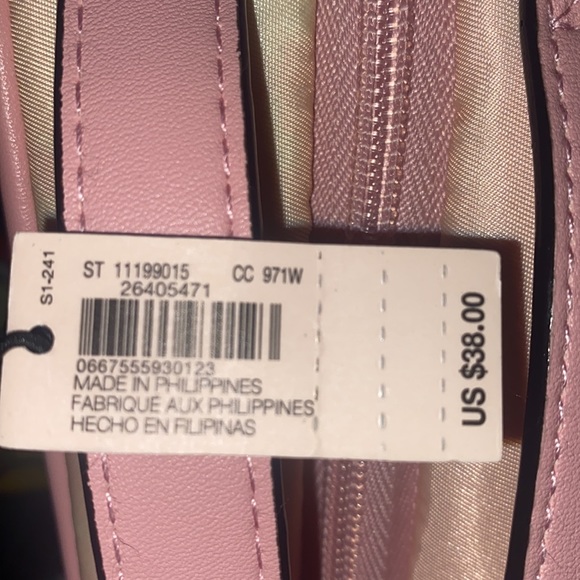 it’s from victoria’s secret , it’s pink and clear. it has a lot of space. - Picture 2 of 2